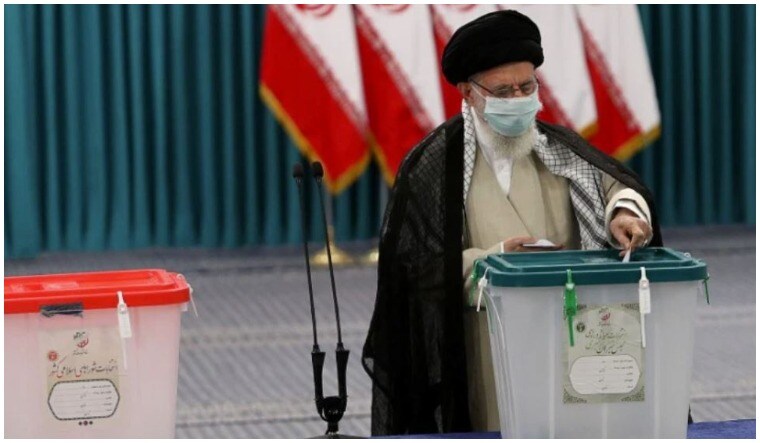Iran's Supreme Leader Ayatollah Ali Khamenei casts his vote during Iranian presidential election in Tehran | Reuters