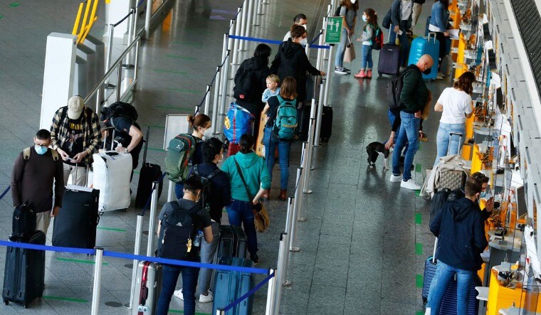 Departing passengers queue at Frankfurt Airport, as the spread of the coronavirus disease (COVID-19) continues in Frankfurt, Germany, April 1, 2021 | Reuters