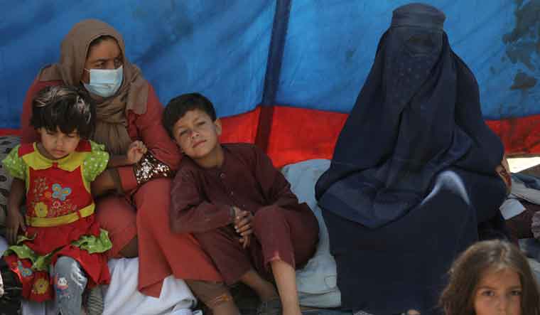 Internally displaced families from northern provinces, who fled from their homes due the fighting between Taliban and Afghan security forces, take shelter in a public park in Kabul, Afghanistan | Reuters