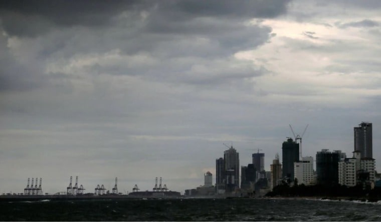 A general view of the main business district as rain clouds gather above in Colombo, Sri Lanka | Reuters