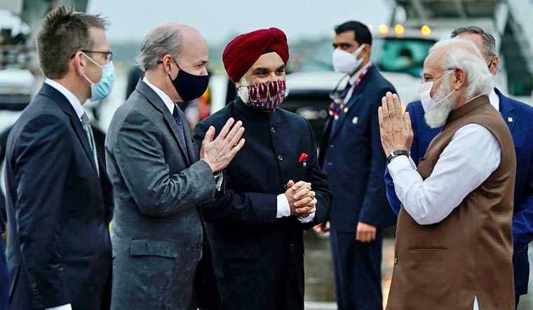 Prime Minister Narendra Modi being received by the Taranjit Singh Sandhu, Ambassador of India to USA and T. H. Brian McKeon, U.S. Deputy Secretary of State for Management and Resources, on his arrival, in Washington DC, Thursday, September 23, 2021 | PTI
