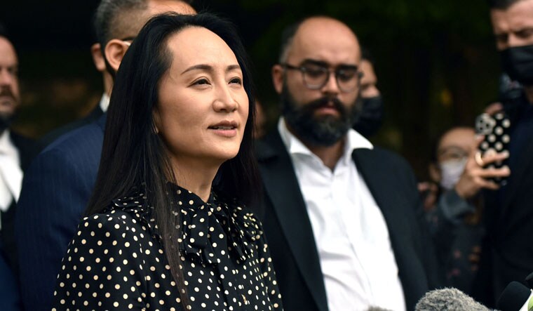 Huawei CFO Meng Wanzhou speaks to the media after her extradition hearing in Canada | AFP