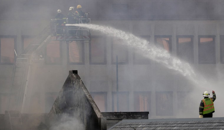 Firefighters working to combat the blaze at South Africa's Parliament | Reuters
