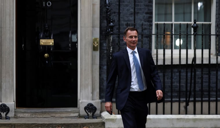 New Chancellor of the Exchequer Jeremy Hunt leaves 10 Downing Street in London, Britain, October 14, 2022. REUTERS/Henry Nicholls