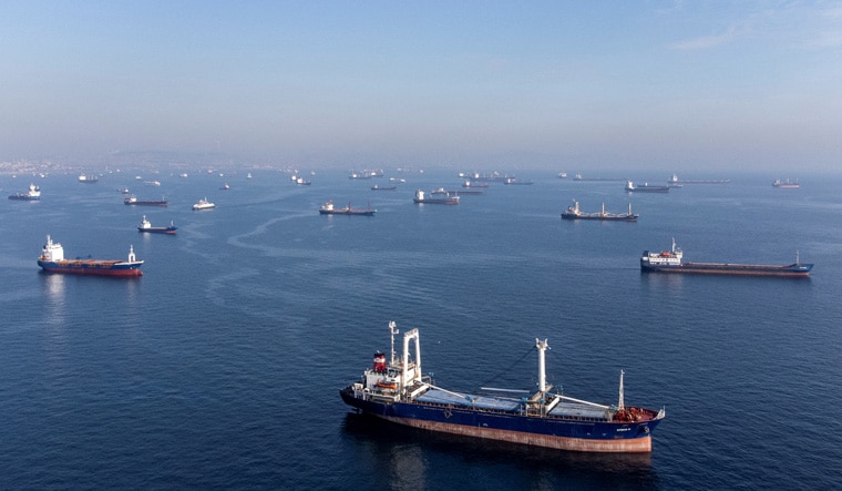 Commercial vessels including vessels which are part of Black Sea grain deal wait to pass the Bosphorus strait off the shores of Yenikapi during a misty morning in Istanbul, Turkey, October 31, 2022. REUTERS/Umit Bektas     TPX IMAGES OF THE DAY     