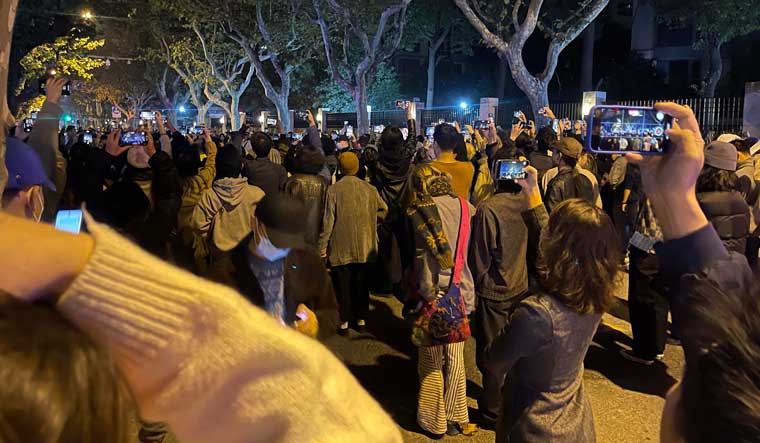 Protests against China's restrictive Covid-19 measures appeared to roil in a number of cities Saturday night in displays of public defiance fanned by anger over a deadly fire in the western Xinjiang region | AP