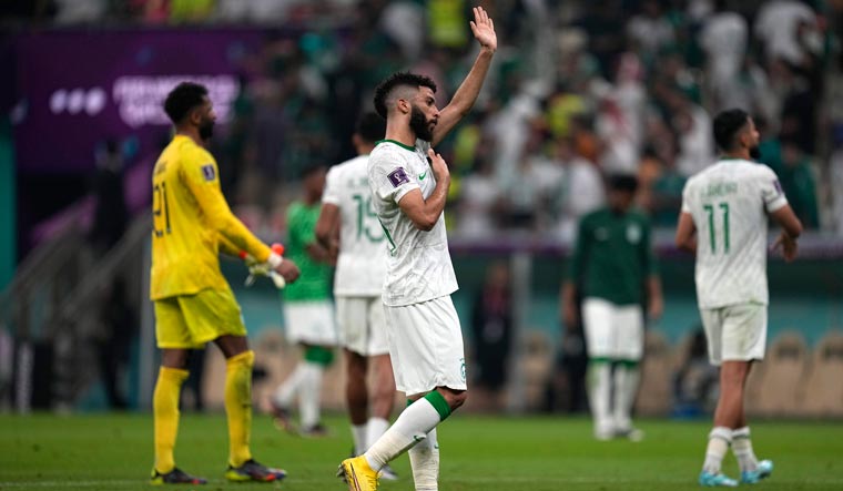 Saudi Arabia's Abdulrahman Al-Aboud reacts at the end of the World Cup group C soccer match against Mexico | AP