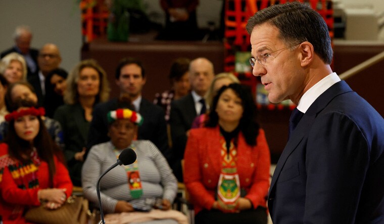 Dutch Prime Minister Mark Rutte apologizes as he responds to recommendations from a panel of experts to accept the role of the Netherlands in the history of slavery and its current consequences in The Hague, Netherlands December 19, 2022. REUTERS/Piroschka van de Wouw