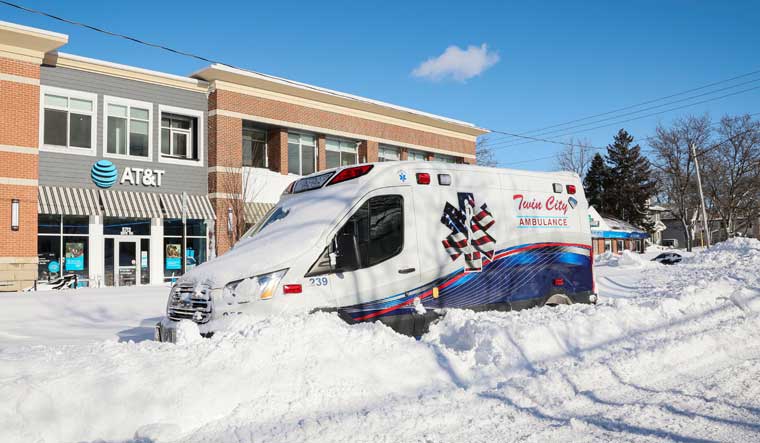 An ambulance left stranded on the road following a winter storm that hit the Buffalo region in New York  on Christmas Day | Reuters