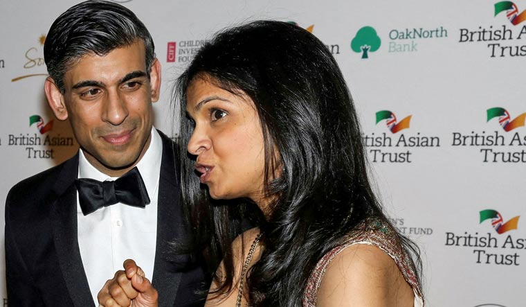 UK Finance Minister Rishi Sunak with wife Akshata Murthy | Reuters