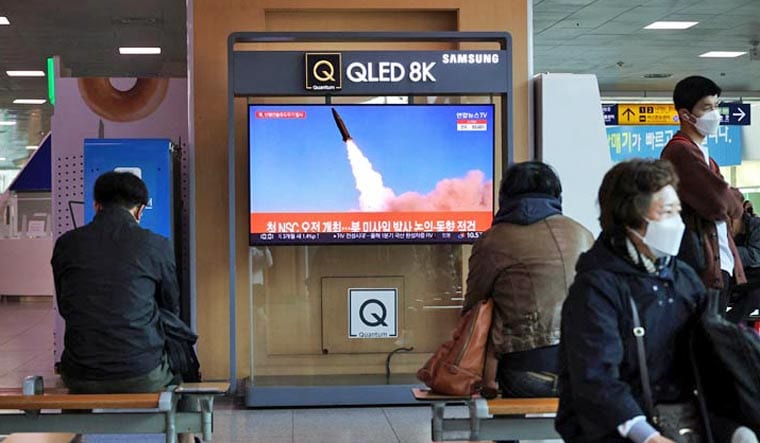 People watch a television broadcasting a news report on North Korea's new type of tactical guided weapon test, at a railway station in Seoul, South Korea, April 17, 2022 | Reuters