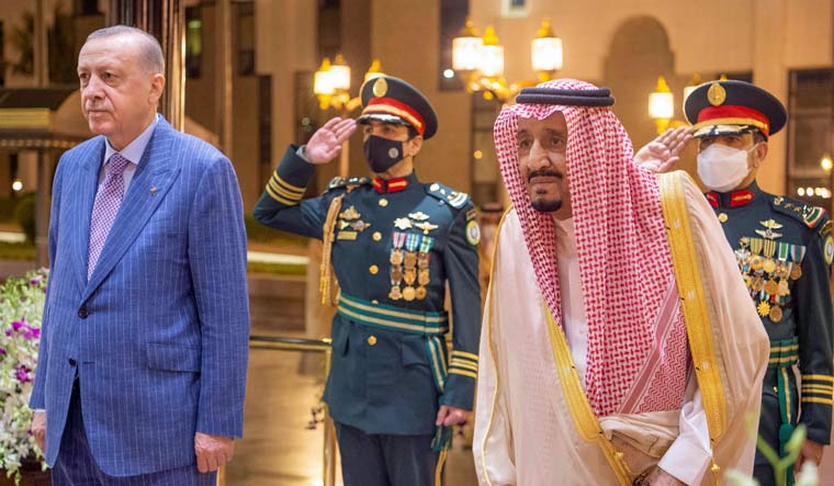 King of Saudi Arabia Salman bin Abdulaziz Al Saud meets Turkish President Recep Tayyip Erdogan upon his arrival in Jeddah, Saudi Arabian, April 28, 2022 | Reuters