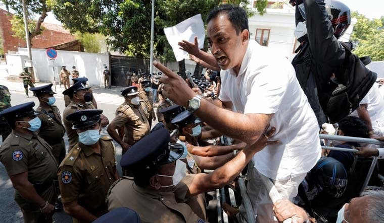 Harshana Rajakaruna, a member of opposition alliance, Samagi Jana Balawegaya, shouts slogans during a protest against President Gotabaya Rajapaksa near Independence Square | Reuters