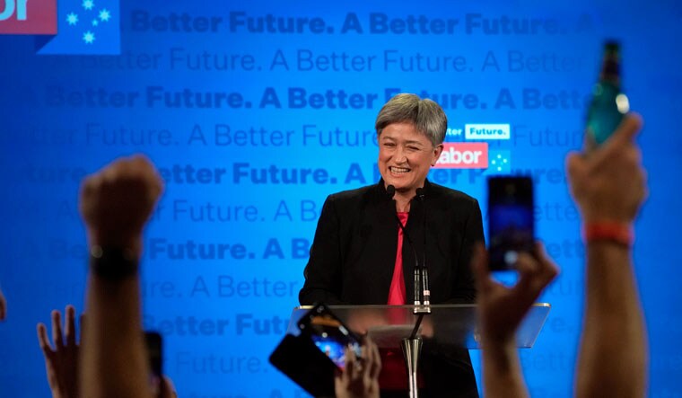 Labor Party senator Penny Wong smiles as she introduces party leader Anthony Albanese at an event in Sydney, Australia, Sunday, May 22, 2022 | AP