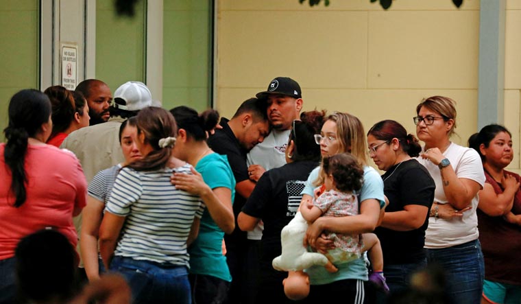 People react outside the Ssgt Willie de Leon Civic Center, where students had been transported from Robb Elementary School after a shooting, in Uvalde, Texas, US May 24, 2022 | Reuters