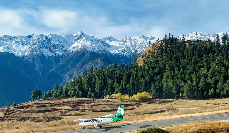 Tara Air's DHC-6 Twin Otter, tail number 9N-AET, in Simikot, Nepal December 1, 2021. Picture taken December 1, 2021 | Reuters