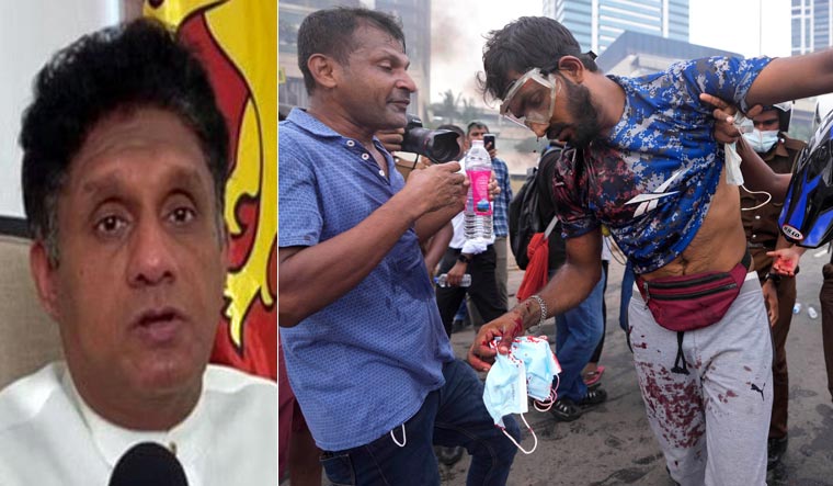 Sajith Premadasa | ANI; Anti-government protesters help a fellow protester who was beaten up by government supporters during a clash in Colombo, Sri Lanka, Monday, May 9, 2022 | AP