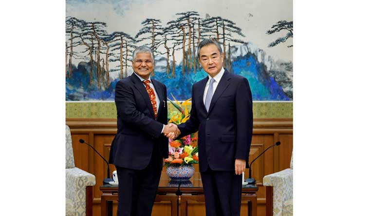Indian Ambassador to China Pradeep Kumar Rawat meets Chinese Foreign Minister Wang Yi ahead of virtual BRICS summit, in Beijing | PTI