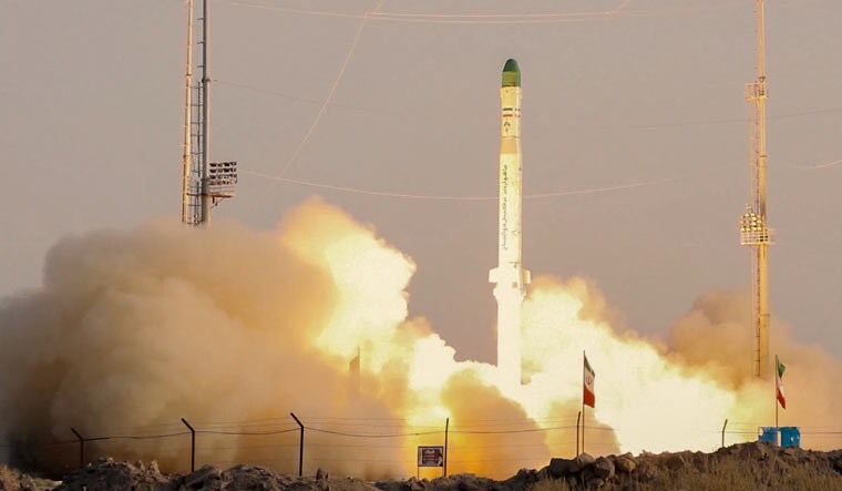 An Iranian satellite-carrier rocket, called Zuljanah, blasting off from an undisclosed location in Iran [Image source: Iran's Ministry of Defence / AFP]