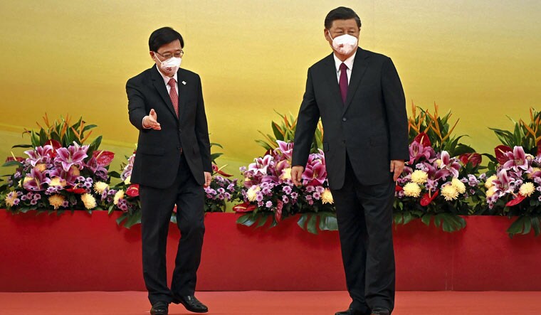 Hong Kong: Hong Kong's new Chief Executive John Lee, left, gestures to China's President Xi Jinping following a swearing-in ceremony to inaugurate the city's new government in Hong Kong, Friday, July 1, 2022 | AP 