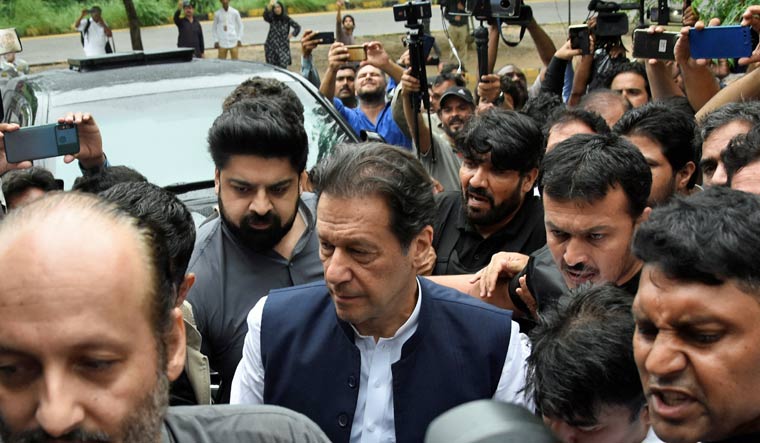 Pakistan's former Prime Minister, Imran Khan, who is facing terrorism charges, appears in court to extend pre-arrest bail, in Islamabad, Pakistan August 25, 2022 | Reuters
