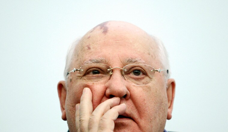 FILE PHOTO: Former Soviet President Mikhail Gorbachev addresses students as he visits the International University in Moscow February 9, 2012. REUTERS/Denis Sinyakov/File Photo