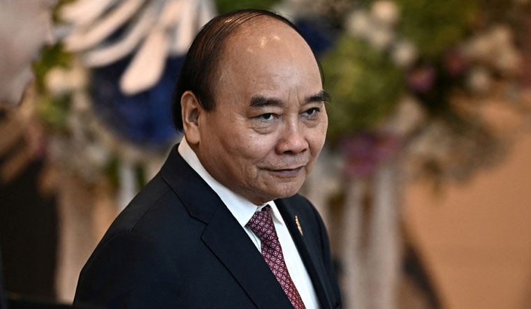 FILE PHOTO: Vietnam's President Nguyen Xuan Phuc arrives to attend APEC Leader's Dialogue with APEC Business Advisory Council during the Asia-Pacific Economic Cooperation (APEC) summit, November 18, 2022, in Bangkok, Thailand. Lillian Suwanrumpha/Pool via REUTERS/File Photo