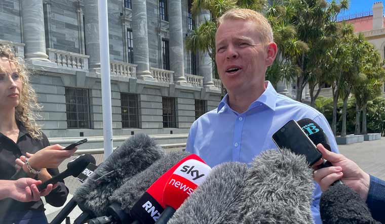 New Zealand Education Minister Chris Hipkins talks to reporters outside parliament in Wellington | AP