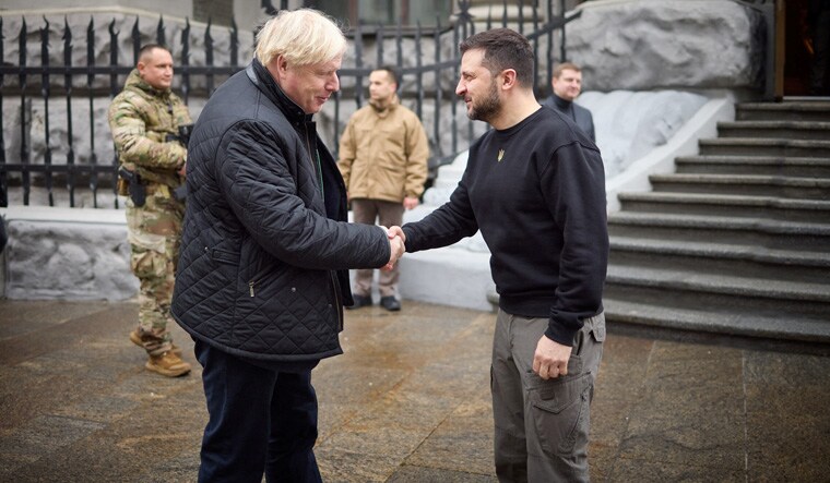 Ukraine's President Volodymyr Zelenskiy shakes hands with former British Prime Minister Boris Johnson as he visits, amid Russia's attack on Ukraine, in Kyiv, Ukraine January 22, 2023.  Ukrainian Presidential Press Service/Handout via REUTERS ATTENTION EDITORS - THIS IMAGE HAS BEEN SUPPLIED BY A THIRD PARTY.