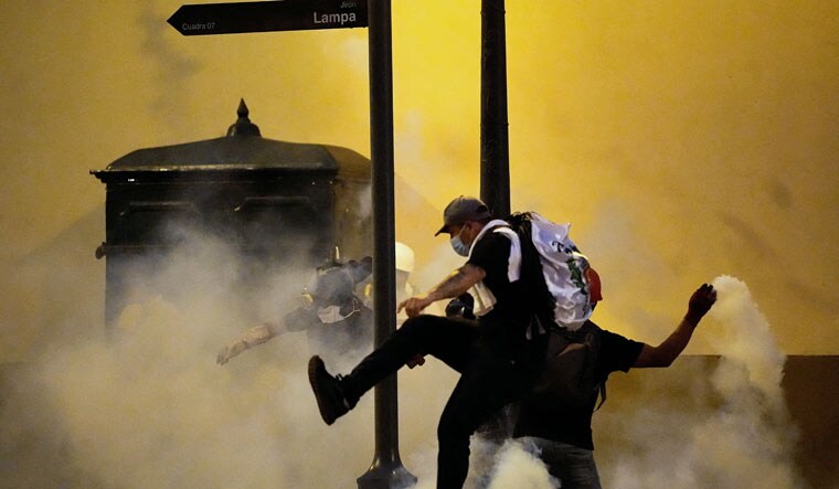 Protesters clash with police officers during an anti-government demonstration following the ouster of Peru's former President Pedro Castillo, in Lima, Peru January 24, 2023 | Reuters 