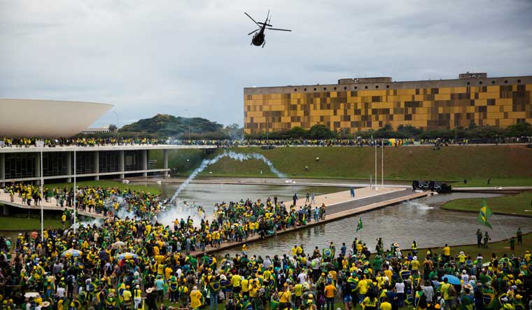 Supporters of Brazil's former President Jair Bolsonaro demonstrate against President Luiz Inacio Lula da Silva, in Brasilia on Sunday | Reuters