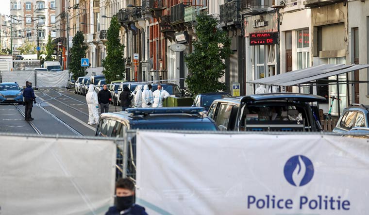 Police officers work after a police operation against a deadly shooting suspect, in Schaerbeek, Brussels, Belgium, October 17, 2023 | Reuters