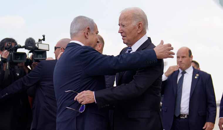 President Joe Biden is greeted by Israeli Prime Minister Benjamin Netanyahu after arriving at Ben Gurion International Airport | AP