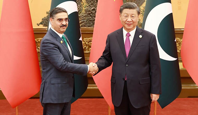 Chinese President Xi Jinping meets Caretaker Prime Minister of Pakistan Anwar-ul-haq Kakar, who is in Beijing for the third Belt and Road Forum for International Cooperation, at the Great Hall of the People in Beijing, China October 19, 2023. China Daily via REUTERS ATTENTION EDITORS - THIS IMAGE WAS PROVIDED BY A THIRD PARTY. CHINA OUT.