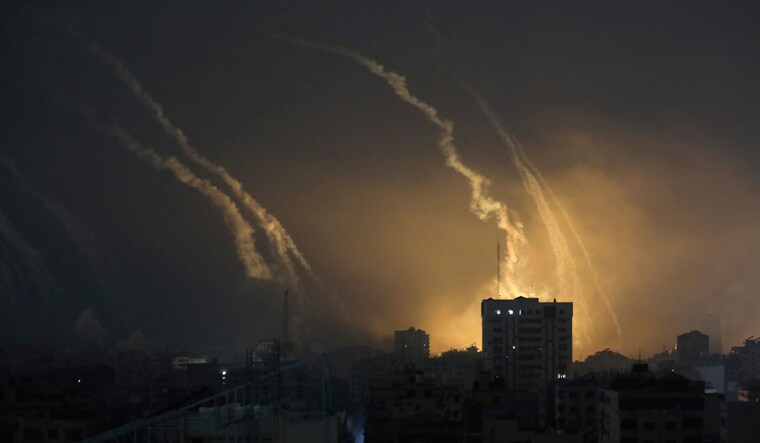 Smoke and explosions caused by Israeli bombardment are seen on the horizon in northern Gaza | AP