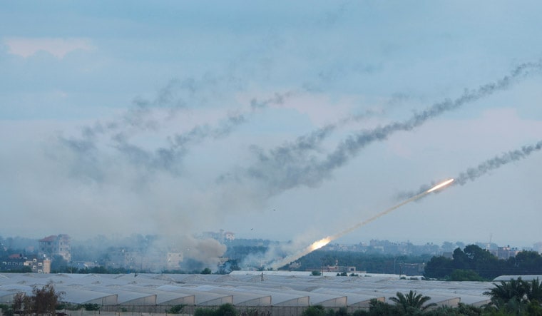 Rockets are fired by Palestinian militants into Israel, in Gaza City October 7, 2023. REUTERS/Ibraheem Abu Mustafa