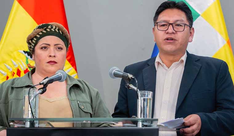Bolivia's deputy Foreign Minister Freddy Mamani (R) speaks next to the minister of the presidency Maria Nela Prada, during a press conference announcing that Bolivia will break relations with Israel | AFP