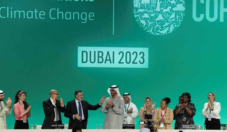 UAE Minister and COP28 President Sultan Ahmed Al Jaber attends the plenary, after a draft of a negotiation deal was released, at the United Nations Climate Change Conference COP28 in Dubai | Reuters