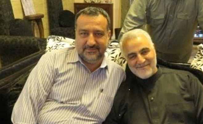 Senior adviser for Iran's Islamic Revolutionary Guard Corps Sayyed Razi Mousavi sits next to late Iranian Major-General Qasem Soleimani in an unknown location | Reuters 