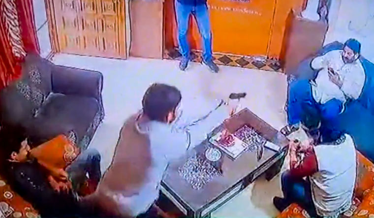 In this screenshot taken from a CCTV footage, Shri Rashtriya Rajput Karni Sena's president Sukhdev Singh Gogamedi is being shot dead in the living room of his house | PTI