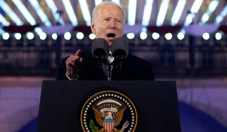 President Joe Biden delivers a speech marking the one-year anniversary of the Russian invasion of Ukraine at the Royal Castle Gardens in Warsaw | AP 