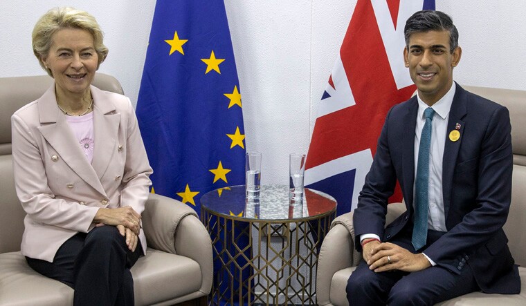 FILE - European Commission President Ursula von der Leyen, left, and British Prime Minister Rishi Sunak meet during the COP27 climate summit in Sharm el-Sheikh, Egypt, Nov. 7, 2022. British Prime Minister Rishi Sunak and European Union leader Ursula von der Leyen are due to meet, the two sides said Sunday Feb. 26, 2023, with expectations high they will seal a deal to resolve a thorny post-Brexit trade dispute. (Steve Reigate/Pool Photo via AP, File)