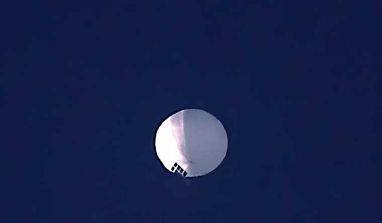A high altitude balloon floats over Billings, Montana, on Wednesday, Feb. 1, 2023. The U.S. is tracking a suspected Chinese surveillance balloon that has been spotted over U.S. airspace for a couple days. But, the Pentagon would not confirm that the balloon in the photo was the surveillance balloon | AP