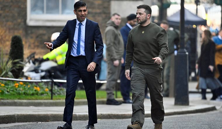 Ukraine's President Volodymyr Zelenskiy and British Prime Minister Rishi Sunak walk outside Number 10 Downing Street in London, Britain, February 8, 2023 | Reuters