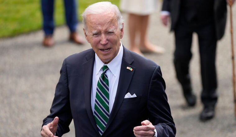 President Joe Biden talks with reporters after meetsing with Irish President Michael Higgins at Aras an Uachtarain, the presidential residence, Thursday, April 13, 2023, in Dublin, Ireland. (AP Photo/Patrick Semansky)