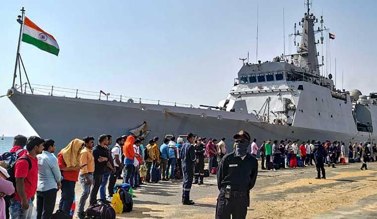 Stranded Indians queue up to board INS Sumedha as they leave violence-hit Sudan for Jeddah under 'Operation Kaveri, in Port Sudan | PTI