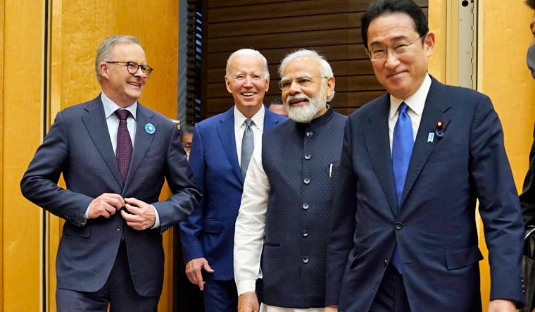 From left, Australian Prime Minister Anthony Albanese, U.S. President Joe Biden and Indian Prime Minister Narendra Modi are greeted by Japanese Prime Minister Fumio Kishida, right, during their arrival to the Quad leaders summit at Kantei Palace, May 24, 2022, in Tokyo | AP