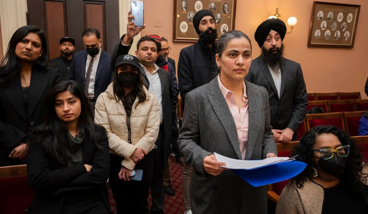 FILE - State Sen. Aisha Wahab listens to speakers during a news conference where she proposed SB 403, a bill that adds caste as a protected category in the state's anti-discrimination laws, in Sacramento, Calif., March 22, 2023. On Thursday, May 11, 2023, the California Senate voted 34-1 in favor of legislation outlawing caste discrimination in the state. If it passes, California could become the first state in the nation to make caste bias illegal by adding it as a protected category in the state's anti-discrimination laws. (AP Photo/José Luis Villegas, File)