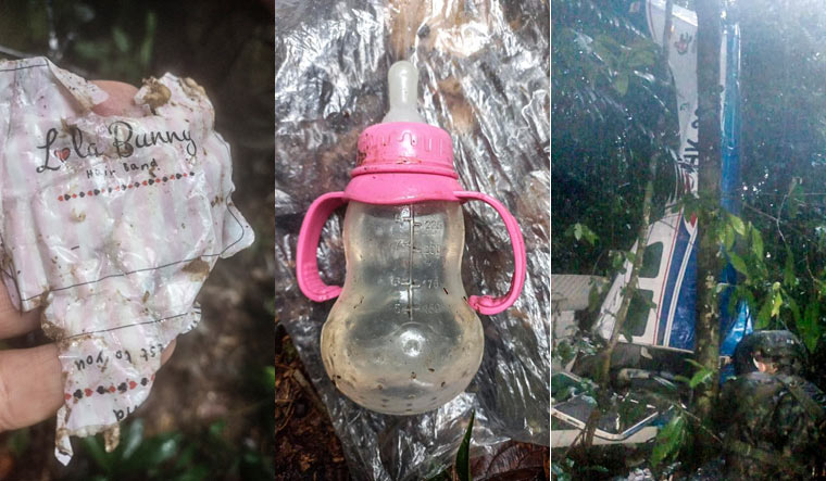 The trail leading to the children included a baby's feeding bottle, a hair tie, scissors and a half eaten piece of fruit | Colombian Army