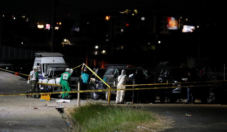 Members of the medical team move the body of a person who was killed in a stampede prior to a soccer game between C.D. FAS Vs. Alianza F.C. at the Cuzcatlan stadium, in San Salvador, El Salvador May 20, 2023 | Reuters
